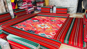 توزيع فرشات للاسر التي تم تجريفها في منطقة المسلخ